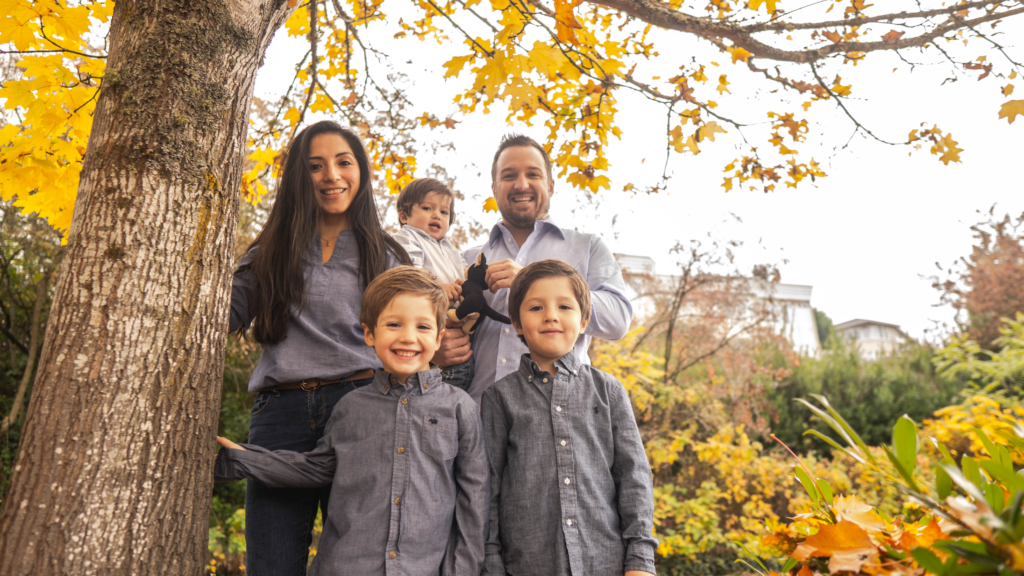 Owner of NextLevel Garage Co. with his wife and three children on a fall day in the Seattle area